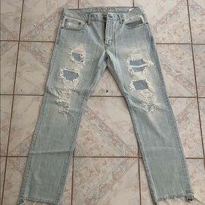 Light blue ripped jeans